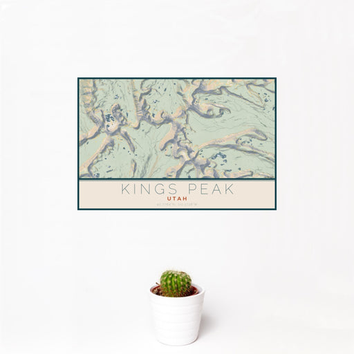 12x18 Kings Peak Utah Map Print Landscape Orientation in Woodblock Style With Small Cactus Plant in White Planter