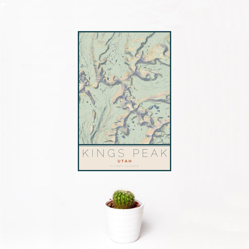 12x18 Kings Peak Utah Map Print Portrait Orientation in Woodblock Style With Small Cactus Plant in White Planter