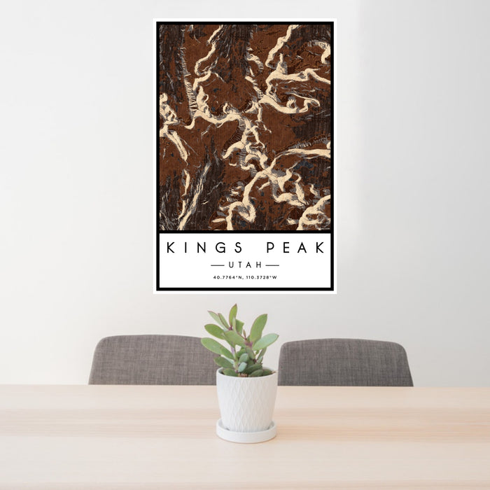 24x36 Kings Peak Utah Map Print Portrait Orientation in Ember Style Behind 2 Chairs Table and Potted Plant