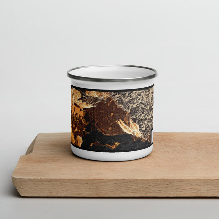 Front View Custom Kingston Jamaica Map Enamel Mug in Ember on Cutting Board