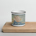 Front View Custom Kingston Jamaica Map Enamel Mug in Woodblock on Cutting Board