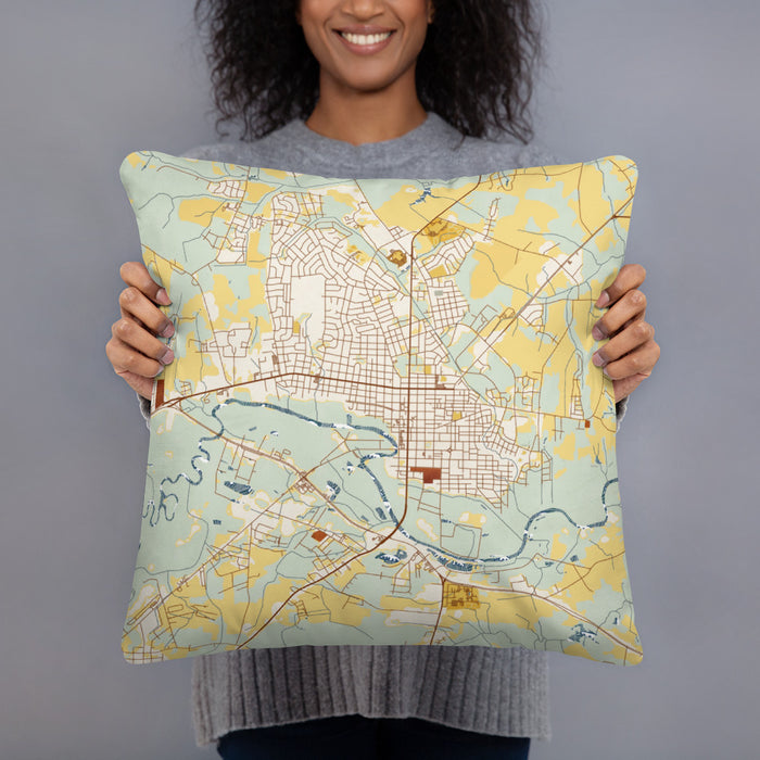 Person holding 18x18 Custom Kinston North Carolina Map Throw Pillow in Woodblock