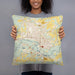 Person holding 18x18 Custom Kinston North Carolina Map Throw Pillow in Woodblock