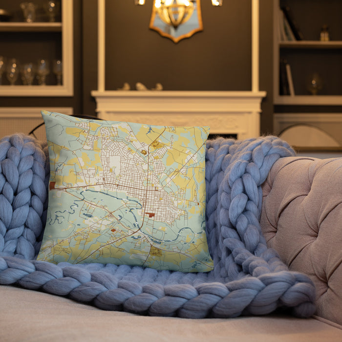 Custom Kinston North Carolina Map Throw Pillow in Woodblock on Cream Colored Couch