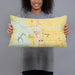 Person holding 20x12 Custom Kirksville Missouri Map Throw Pillow in Woodblock