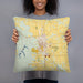 Person holding 18x18 Custom Kirksville Missouri Map Throw Pillow in Woodblock