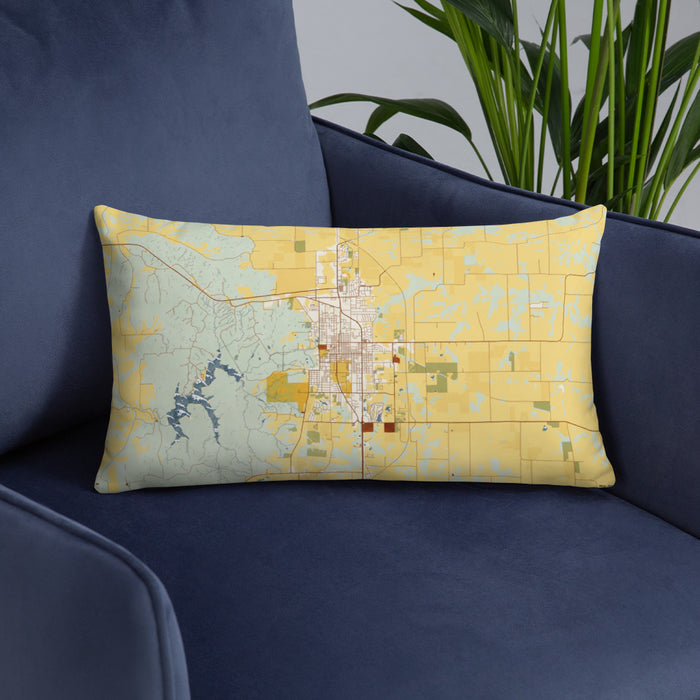 Custom Kirksville Missouri Map Throw Pillow in Woodblock on Blue Colored Chair
