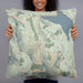 Person holding 22x22 Custom Kirkwood California Map Throw Pillow in Woodblock