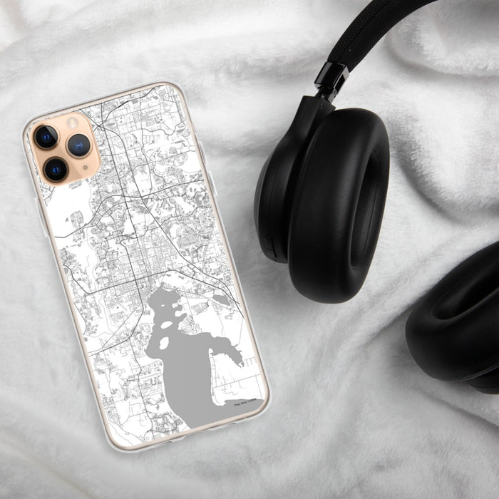 Custom Kissimmee Florida Map Phone Case in Classic on Table with Black Headphones