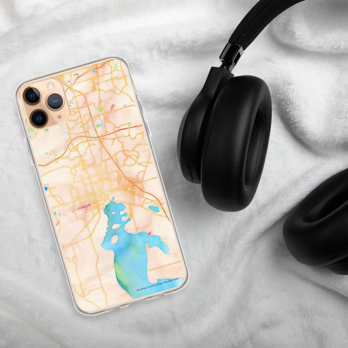 Custom Kissimmee Florida Map Phone Case in Watercolor on Table with Black Headphones