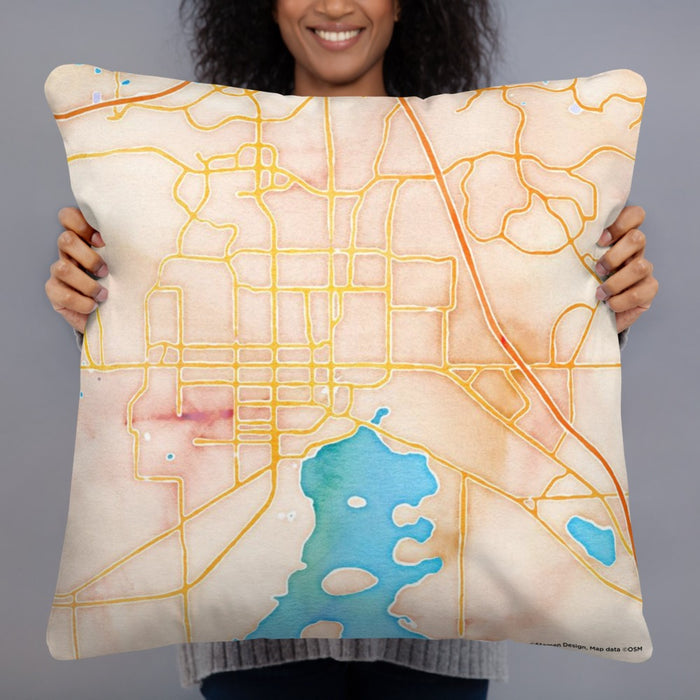 Person holding 22x22 Custom Kissimmee Florida Map Throw Pillow in Watercolor