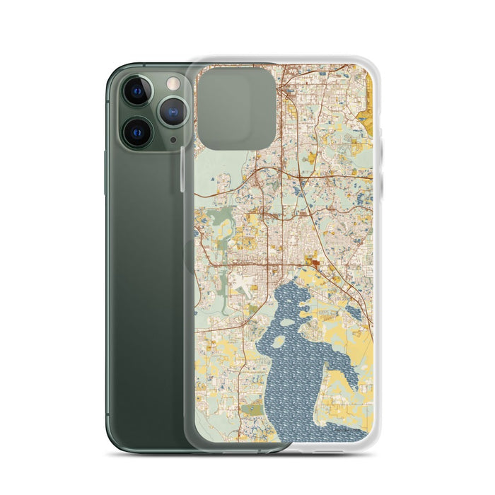 Custom Kissimmee Florida Map Phone Case in Woodblock on Table with Laptop and Plant