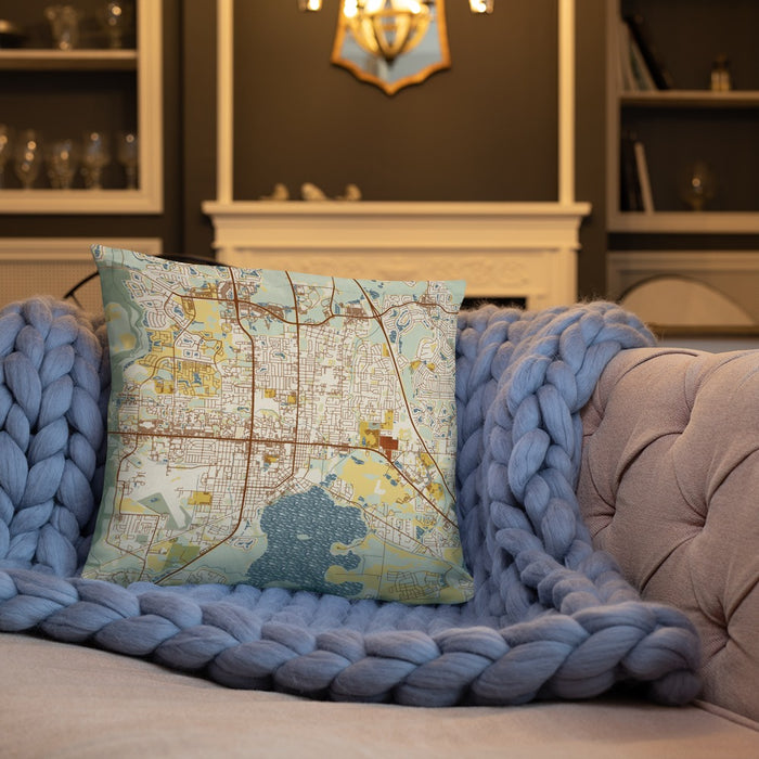 Custom Kissimmee Florida Map Throw Pillow in Woodblock on Cream Colored Couch