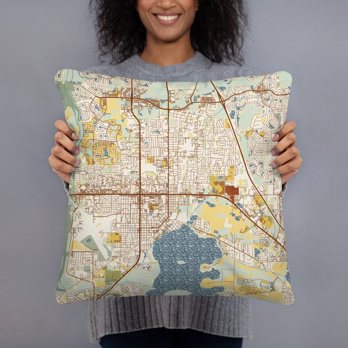 Person holding 18x18 Custom Kissimmee Florida Map Throw Pillow in Woodblock