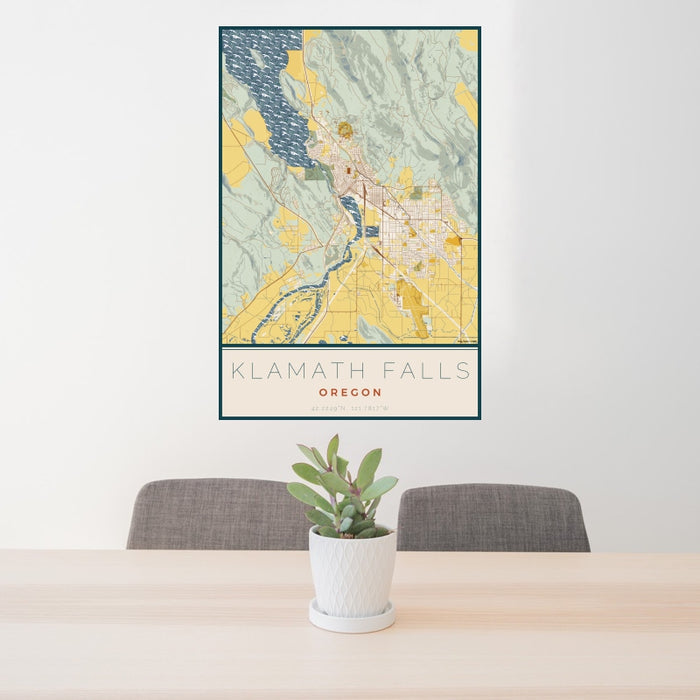 24x36 Klamath Falls Oregon Map Print Portrait Orientation in Woodblock Style Behind 2 Chairs Table and Potted Plant