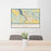 24x36 Klamath Falls Oregon Map Print Landscape Orientation in Woodblock Style Behind 2 Chairs Table and Potted Plant