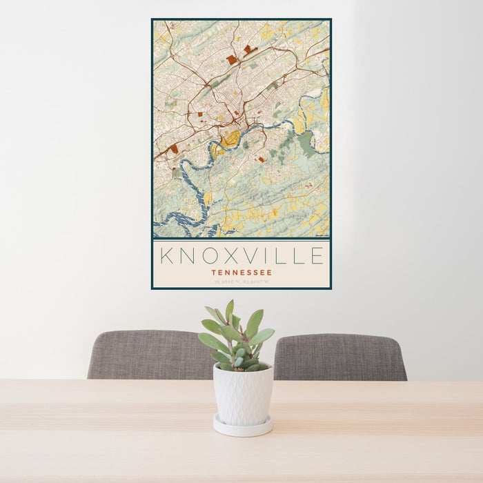 24x36 Knoxville Tennessee Map Print Portrait Orientation in Woodblock Style Behind 2 Chairs Table and Potted Plant