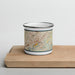 Front View Custom Knoxville Tennessee Map Enamel Mug in Woodblock on Cutting Board