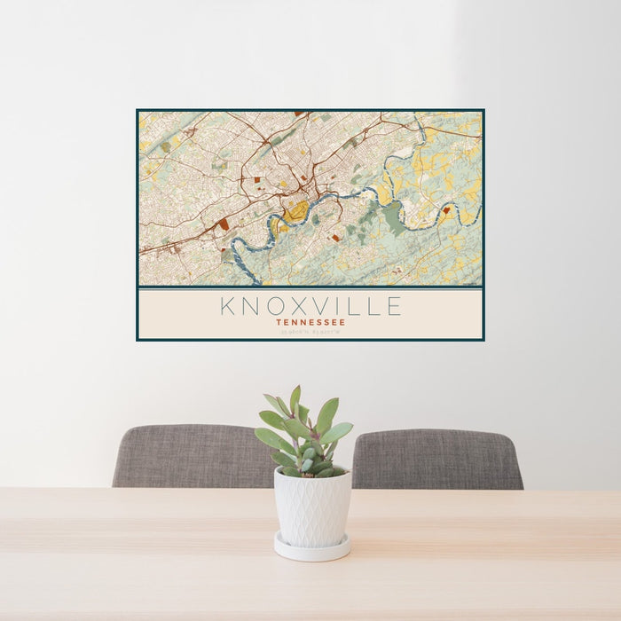 24x36 Knoxville Tennessee Map Print Landscape Orientation in Woodblock Style Behind 2 Chairs Table and Potted Plant
