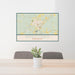 24x36 Kosciusko Mississippi Map Print Lanscape Orientation in Woodblock Style Behind 2 Chairs Table and Potted Plant