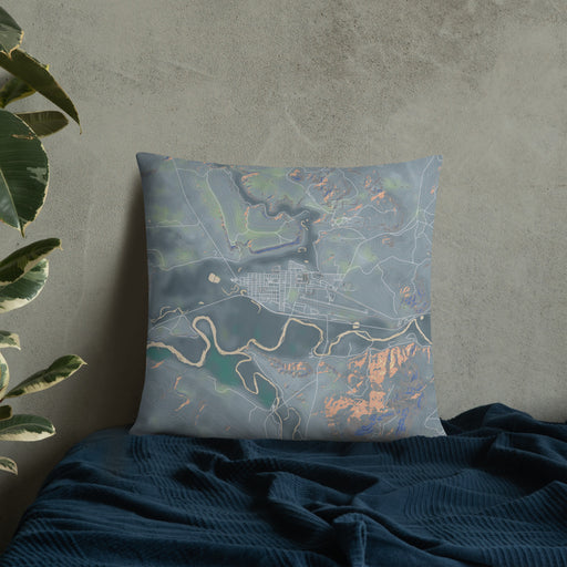Custom Kremmling Colorado Map Throw Pillow in Afternoon on Bedding Against Wall