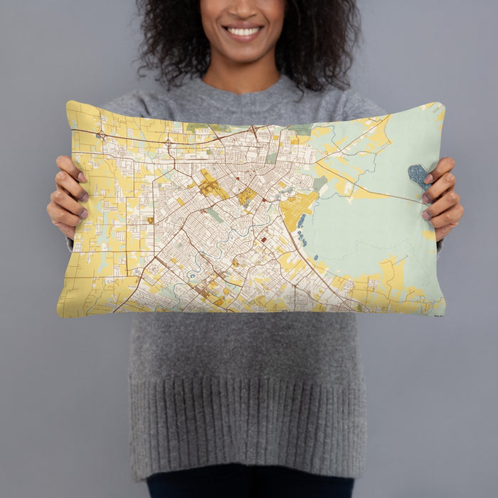 Person holding 20x12 Custom Lafayette Louisiana Map Throw Pillow in Woodblock