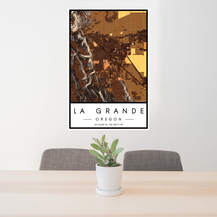 24x36 La Grande Oregon Map Print Portrait Orientation in Ember Style Behind 2 Chairs Table and Potted Plant