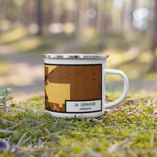 Right View Custom La Grande Oregon Map Enamel Mug in Ember on Grass With Trees in Background