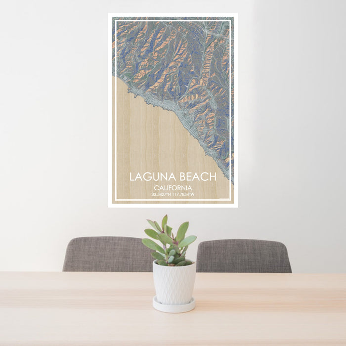 24x36 Laguna Beach California Map Print Portrait Orientation in Afternoon Style Behind 2 Chairs Table and Potted Plant