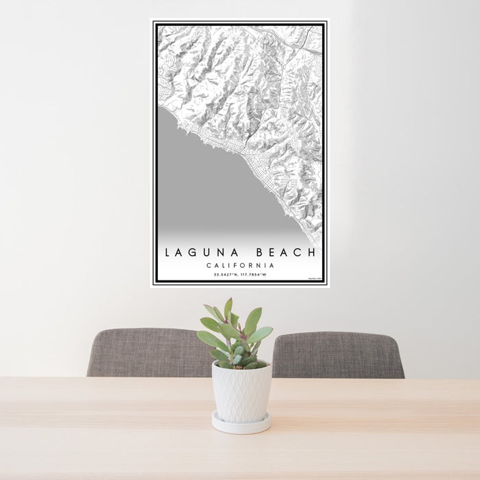 24x36 Laguna Beach California Map Print Portrait Orientation in Classic Style Behind 2 Chairs Table and Potted Plant
