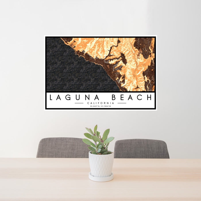 24x36 Laguna Beach California Map Print Landscape Orientation in Ember Style Behind 2 Chairs Table and Potted Plant