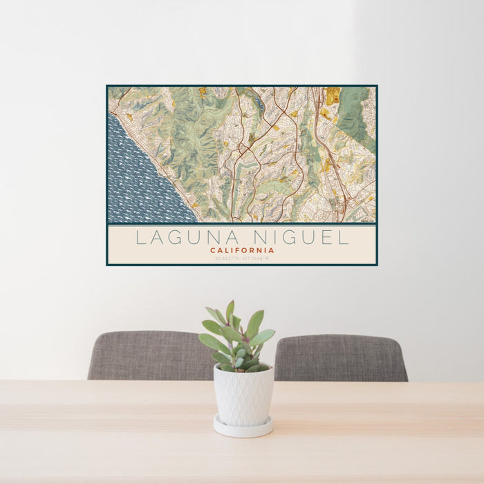 24x36 Laguna Niguel California Map Print Lanscape Orientation in Woodblock Style Behind 2 Chairs Table and Potted Plant