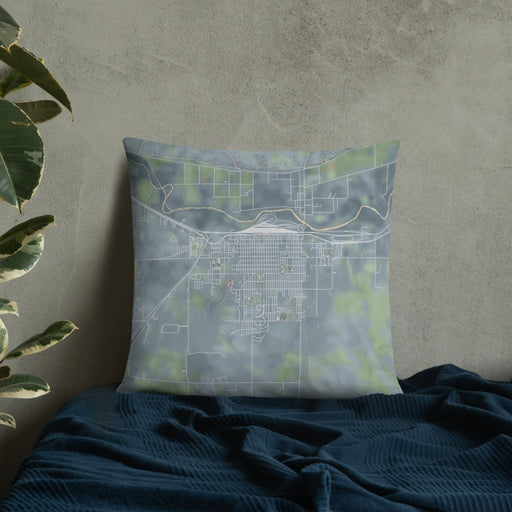 Custom La Junta Colorado Map Throw Pillow in Afternoon on Bedding Against Wall