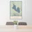 24x36 Lake Almanor California Map Print Portrait Orientation in Woodblock Style Behind 2 Chairs Table and Potted Plant