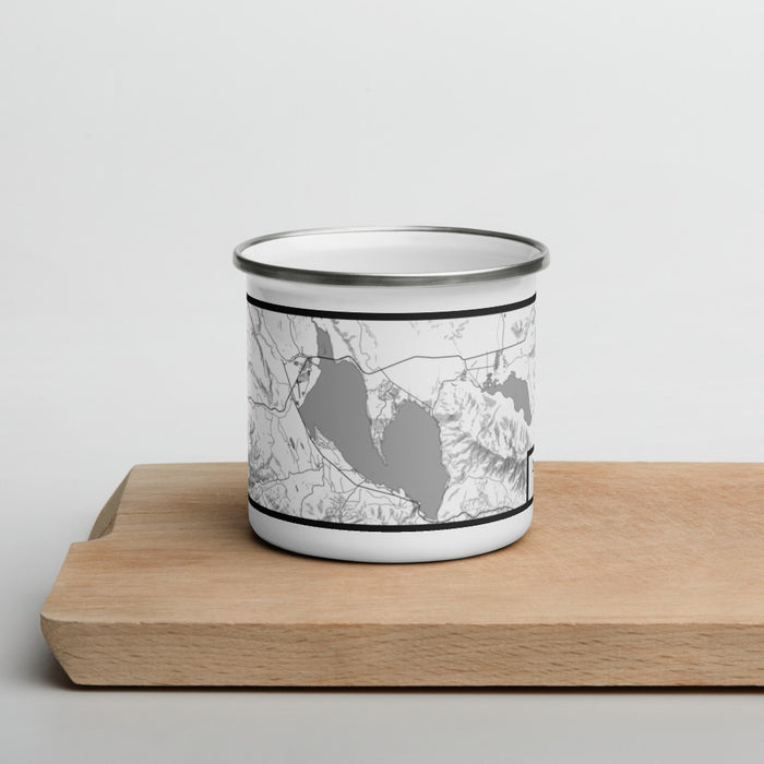 Front View Custom Lake Almanor California Map Enamel Mug in Classic on Cutting Board