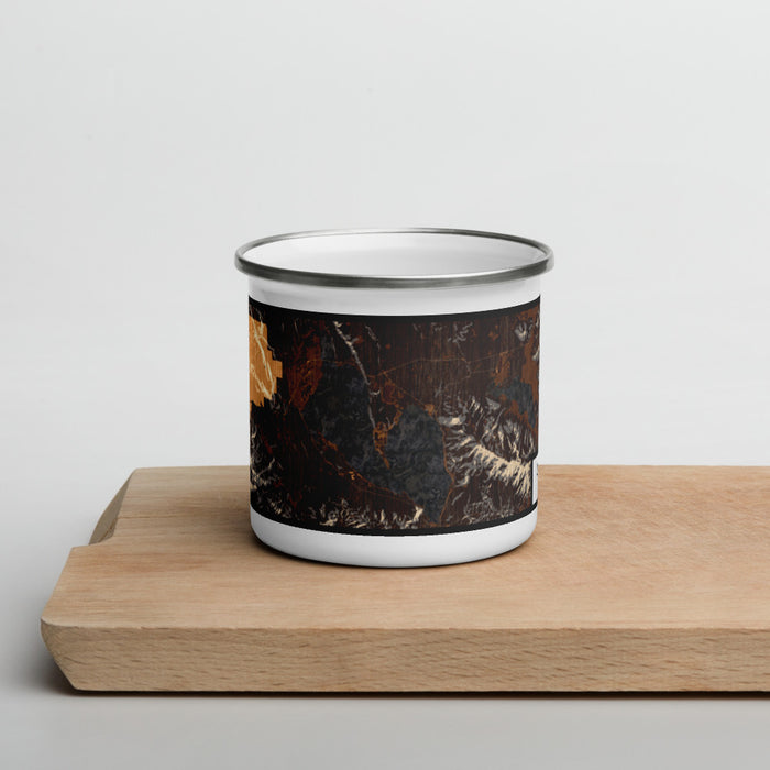 Front View Custom Lake Almanor California Map Enamel Mug in Ember on Cutting Board