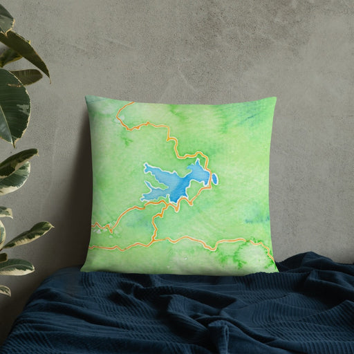 Custom Lake Arrowhead California Map Throw Pillow in Watercolor on Bedding Against Wall