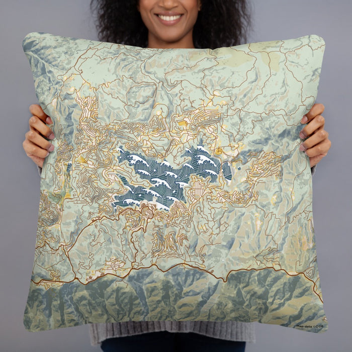 Person holding 22x22 Custom Lake Arrowhead California Map Throw Pillow in Woodblock