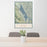 24x36 Lake Berryessa California Map Print Portrait Orientation in Woodblock Style Behind 2 Chairs Table and Potted Plant