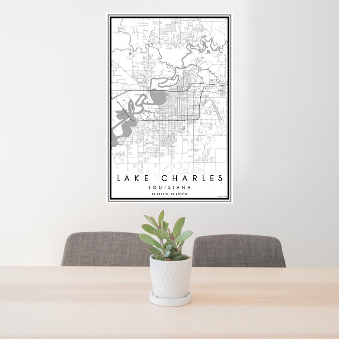 24x36 Lake Charles Louisiana Map Print Portrait Orientation in Classic Style Behind 2 Chairs Table and Potted Plant