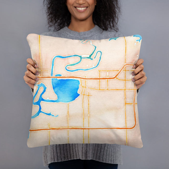 Person holding 18x18 Custom Lake Charles Louisiana Map Throw Pillow in Watercolor