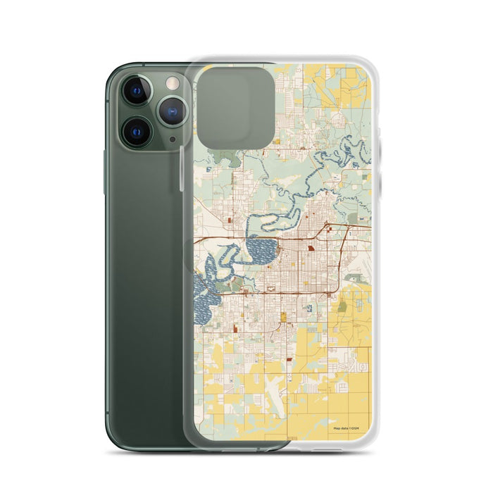 Custom Lake Charles Louisiana Map Phone Case in Woodblock on Table with Laptop and Plant