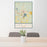 24x36 Lake City Florida Map Print Portrait Orientation in Woodblock Style Behind 2 Chairs Table and Potted Plant