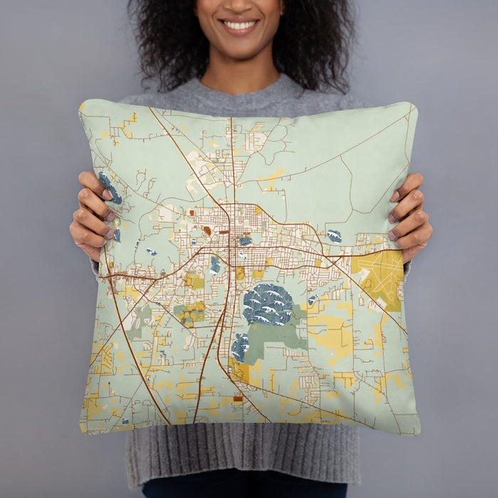Person holding 18x18 Custom Lake City Florida Map Throw Pillow in Woodblock