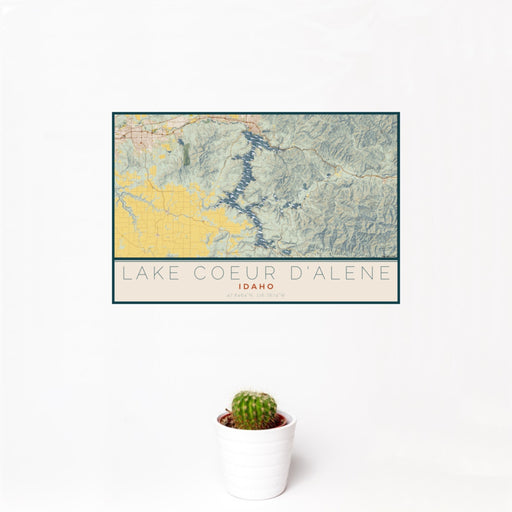 12x18 Lake Coeur d'Alene Idaho Map Print Landscape Orientation in Woodblock Style With Small Cactus Plant in White Planter