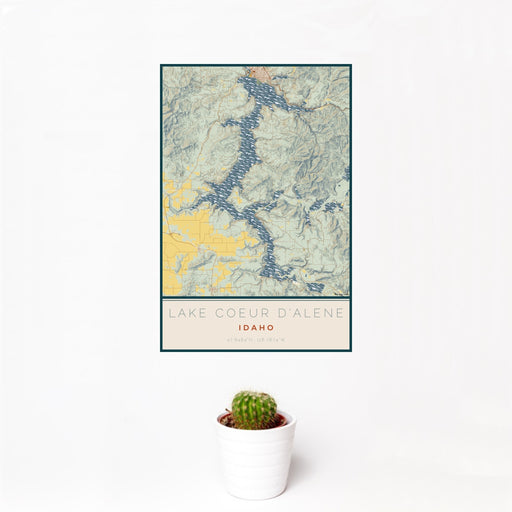 12x18 Lake Coeur d'Alene Idaho Map Print Portrait Orientation in Woodblock Style With Small Cactus Plant in White Planter