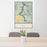 24x36 Lake Coeur d'Alene Idaho Map Print Portrait Orientation in Woodblock Style Behind 2 Chairs Table and Potted Plant