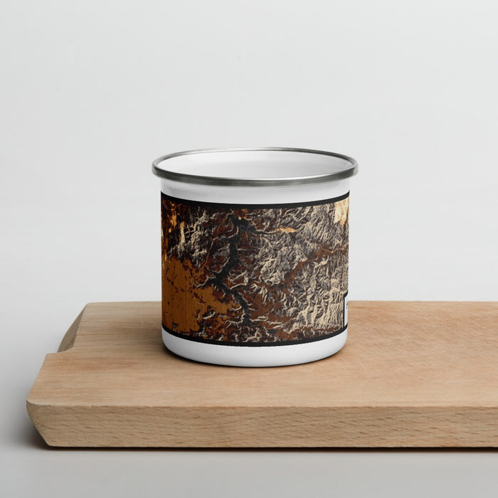Front View Custom Lake Coeur d'Alene Idaho Map Enamel Mug in Ember on Cutting Board