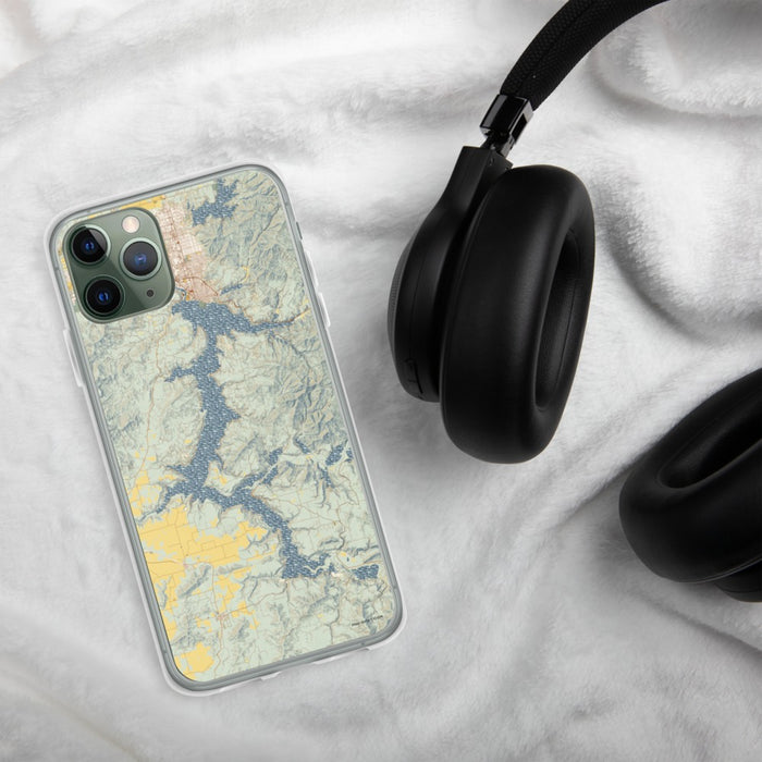 Custom Lake Coeur d'Alene Idaho Map Phone Case in Woodblock on Table with Black Headphones