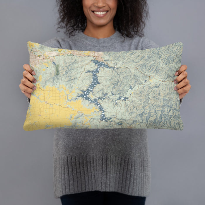 Person holding 20x12 Custom Lake Coeur d'Alene Idaho Map Throw Pillow in Woodblock